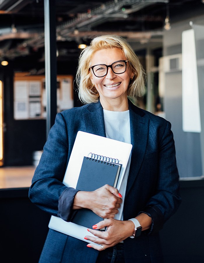 happy-50s-confident-mature-businesswoman-middle-ag-YJASRBA.jpg